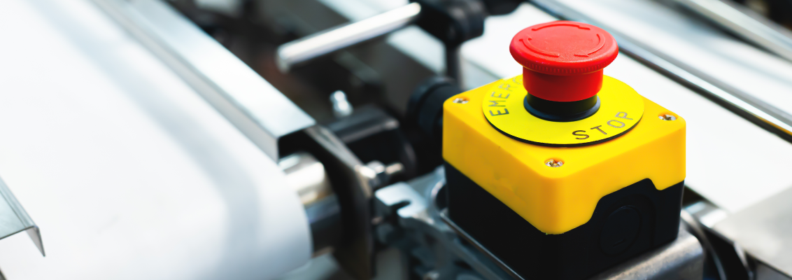 Emergency stop push button on an industrial machine