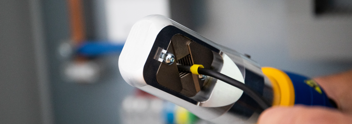 Crimping a cable end sleeve using the Klauke EKWF120ML tool with integrated dies.