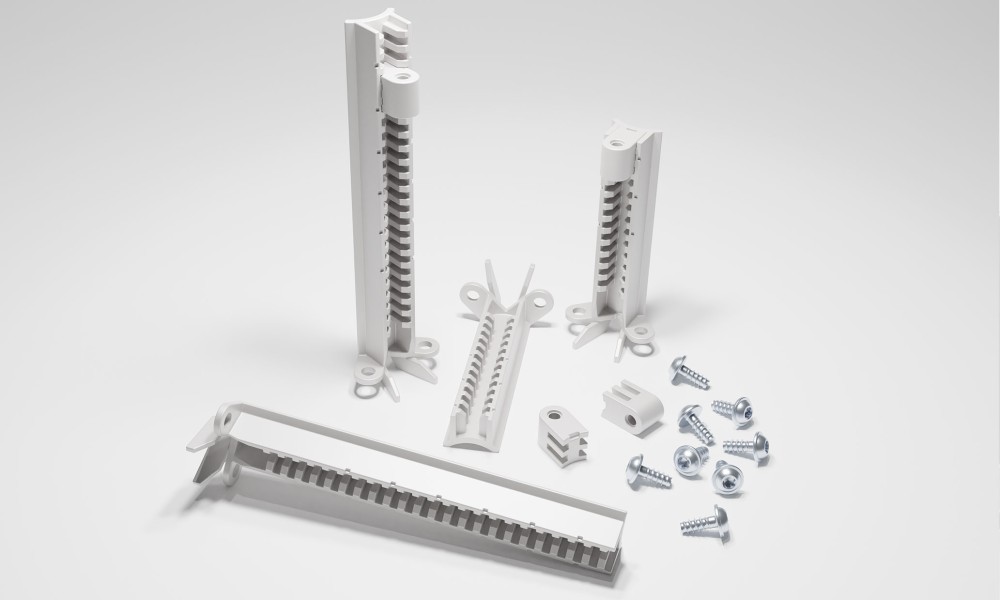 Picture of the accessories (level adapter) for the new MULTI-BOX MBI-L enclosures.